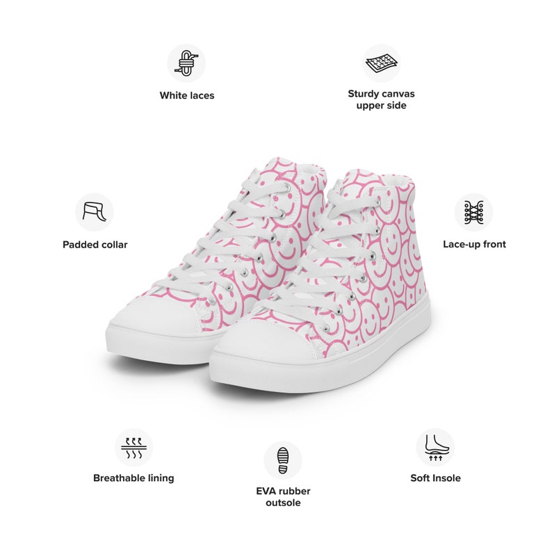 Peut inclure: Baskets montantes blanches avec un motif de visages souriants roses. Elles sont dot&eacute;es de lacets blancs, d'un col rembourr&eacute; et d'une doublure respirante. Les chaussures ont une tige en toile robuste et une semelle ext&eacute;rieure en caoutchouc EVA.