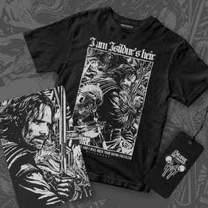 May include: Black t-shirt with a white graphic print of a man holding a sword. The graphic includes the text "I am Isildur's heir" and "And I will hold your oaths fulfilled".