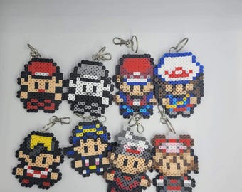 Llaveros/imanes de entrenadores Pokémon