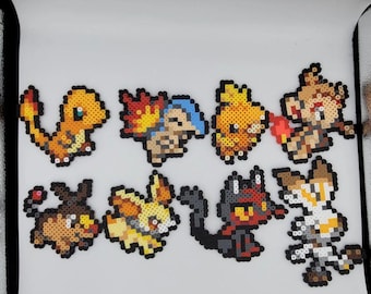 Llaveros/imanes de Pokémon - Pokémon iniciales de tipo Fuego