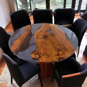 Designer round black resin table
Handcrafted black epoxy dining table
Solid wood black epoxy round table
Modern black epoxy river table