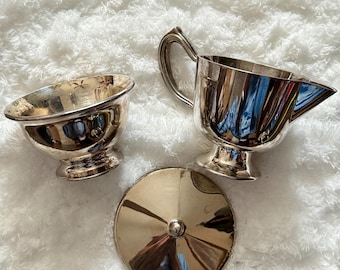 Vintage Silver-plated Set of Footed Creamer with lid and Sugar Bowl.