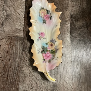 Leaf Shaped Porcelain Dish/Candy Tray with Gold Trim Highlights and Gold Accented Handle.