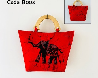 Sac d’éléphant rouge avec poignée en bois