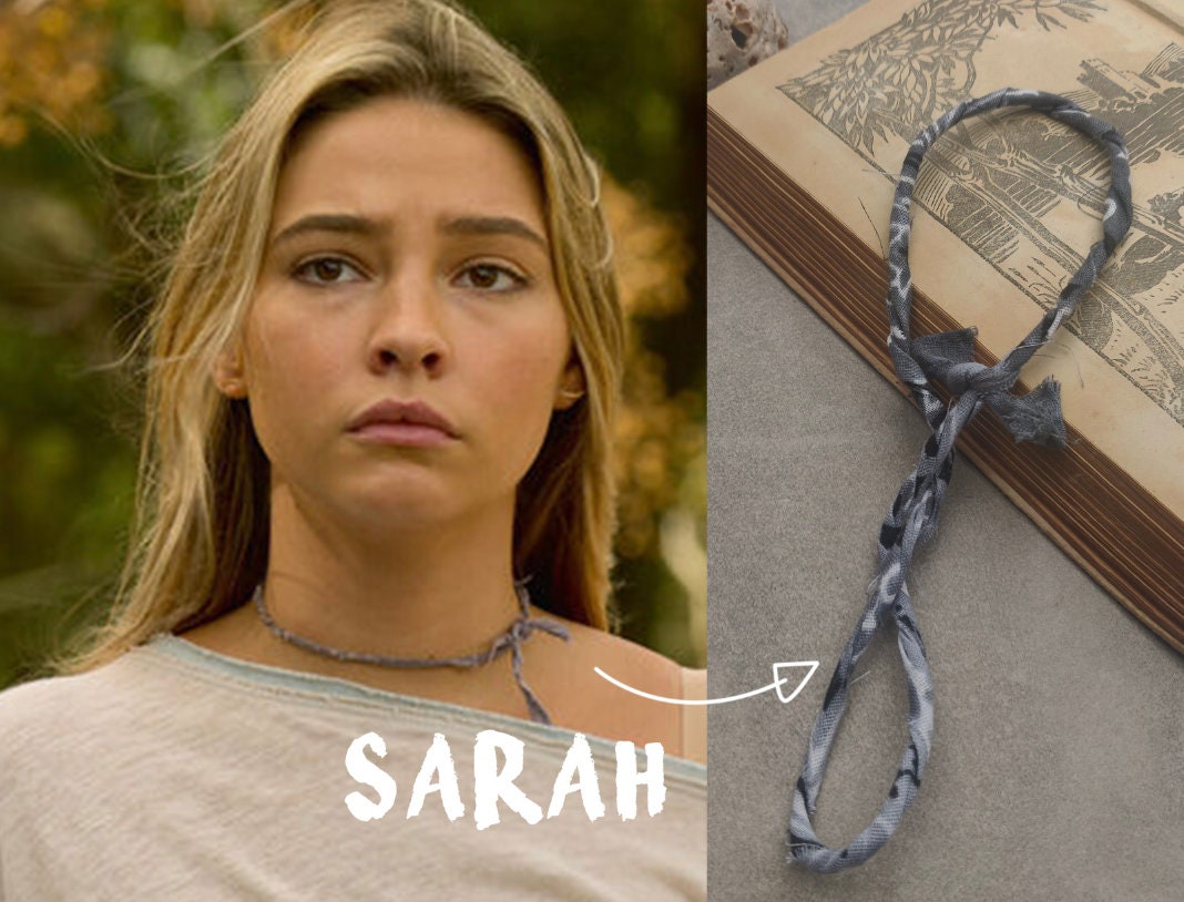 What's Hot Jewelry Small Gold Initial Necklace worn by Sarah Cameron  (Madelyn Cline) as seen in Outer Banks (S01E01) | Spotern
