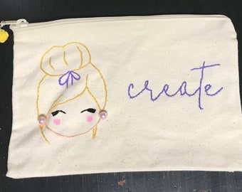 Hand embroidered zipper pouch