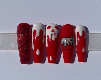 Uñas postizas reutilizables de manzana venenosa