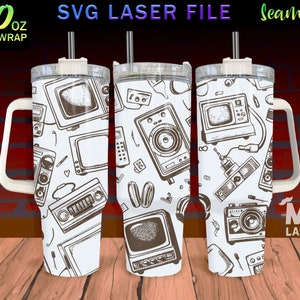 May include: A white 40 ounce tumbler with a handle and a straw. The tumbler is covered in a seamless pattern of black and white illustrations of vintage electronics, including televisions, radios, and cassette players.