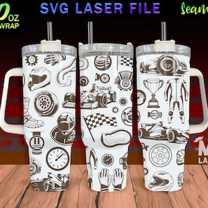 May include: A white 40 ounce tumbler with a seamless design featuring a racing theme. The design includes a race car, helmet, chequered flag, and other racing-related imagery. The tumbler has a white handle and lid.