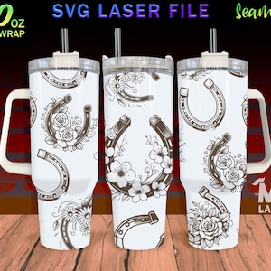 May include: White 40 ounce stainless steel tumbler with a handle and a lid. The tumbler has a seamless design featuring a repeating pattern of horseshoes and floral accents.