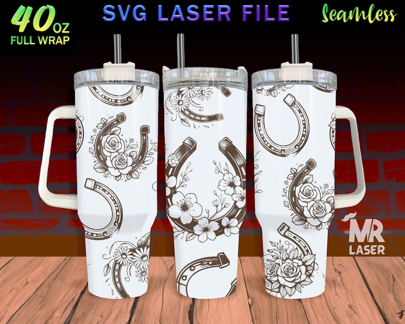May include: White 40 ounce stainless steel tumbler with a handle and a lid. The tumbler has a seamless design featuring a repeating pattern of horseshoes and floral accents.
