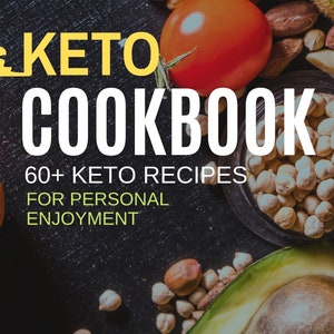 May include: A close-up of a keto cookbook with a black background and a variety of ingredients, including avocado, chickpeas, nuts, and tomatoes. The cookbook title is "Keto Cookbook" with the text "60+ Keto Recipes for Personal Enjoyment".