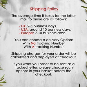 May include: A white informational sign with olive branch borders featuring the text Shipping Policy, The average time it takes for the letter mail to arrive are as follows: UK: 2-5 business days, USA: around 10 business days, Europe: 7-10 business days.