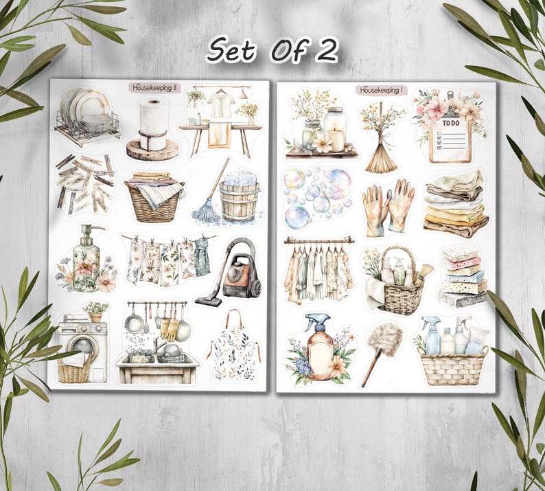 May include: Two sticker sheets with watercolor illustrations of housekeeping items. The sheets include images of dishes, laundry, cleaning supplies, and a washing machine. The text "Set Of 2" is at the top.