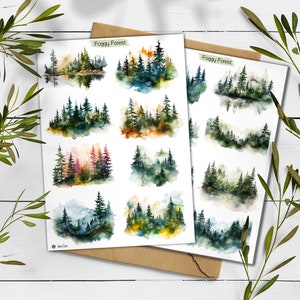 May include: A sheet of stickers featuring watercolor illustrations of foggy forests in various shades of green, blue, and brown. The stickers are labeled "Foggy Forest".