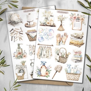 May include: Two sheets of stickers with watercolor illustrations of household items. The stickers include images of dishes, laundry, cleaning supplies, and a to-do list. The sheets are labeled "Housekeeping I" and "Housekeeping II".