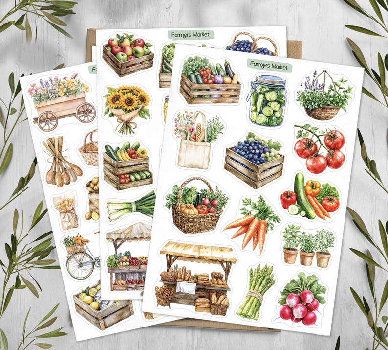 May include: A collection of sticker sheets featuring watercolor illustrations of farmers market items, including wooden crates of produce, sunflowers, a jar of pickles, a market stall, fresh vegetables, herbs in pots, and a tote bag with the text Farmers Market.