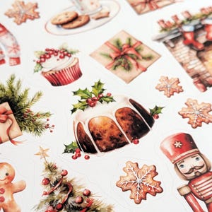May include: A sticker sheet featuring various Christmas-themed illustrations including a red truck, cookies with milk, wrapped gifts, a fireplace, a cupcake, a Christmas pudding with holly, a gingerbread person, a tree, and a nutcracker.