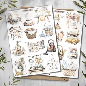 May include: Two sheets of watercolor stickers with a housekeeping theme. The stickers depict various cleaning supplies, laundry items, and kitchenware. The text "Housekeeping" is visible on the top of each sheet. The color palette is soft, with muted tones of beige, green, and brown.