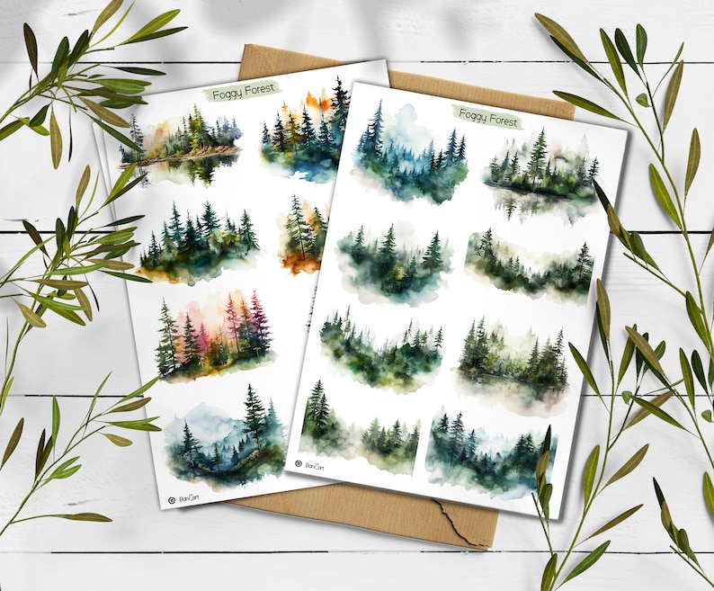 May include: A sheet of stickers featuring watercolor illustrations of foggy forests. The stickers are arranged in a grid pattern and have the text "Foggy Forest" at the top.