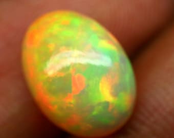 Natural White Ethiopian Opal Cabochon Multi Fire Opal, Oval Shape 11.7x8.9x5.6 MM, 2.9 Carat Weight, Jewelry Making Loose Gemstone