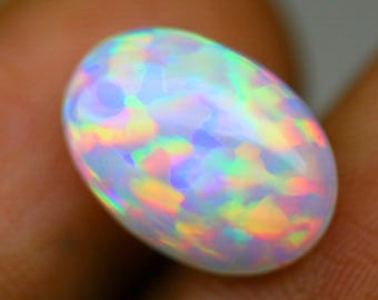 Oval Ethiopian Opal Gemstone, Natural Play of Color Stone, 3.3 Ct 13.4x9.5x5.4 mm opal for jewelry