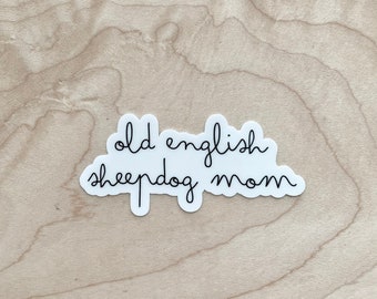 May include: White sticker with black cursive text that reads "old english sheepdog mom".