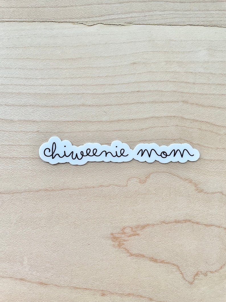 May include: White sticker with black cursive text that reads "chiweenie mom".