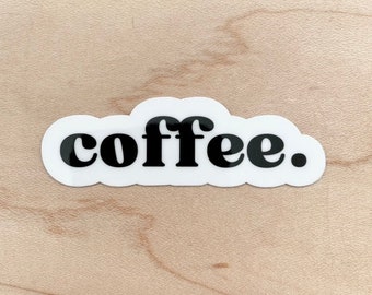 May include: White sticker with black text that reads "coffee." The sticker has a rounded, cloud-like shape.