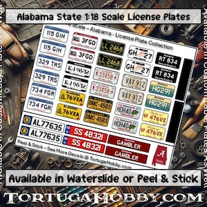 May include: A sheet of 1:18 scale Alabama license plate decals featuring various alphanumeric combinations, colors, and designs. The sheet includes text such as Alabama State 1:18 Scale License Plates, Peel & Stick, and TortugaHobby.com.