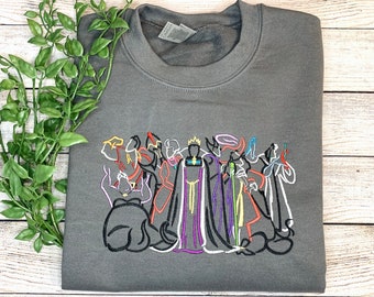 Suéter de cuello redondo bordado con boceto de villano malvado