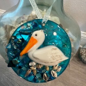 Pelican Seashell Ornament, Ocean Ornaments, Beach Ornaments, Pelican Ornament, Christmas Ornaments, rear view mirror charms, sun catcher