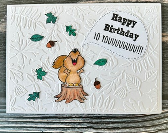 handmade birthday card with embossed background, cute squirrel