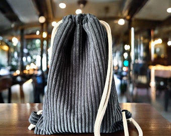 Wide corduroy backpack in anthracite, available in two sizes, gym bag