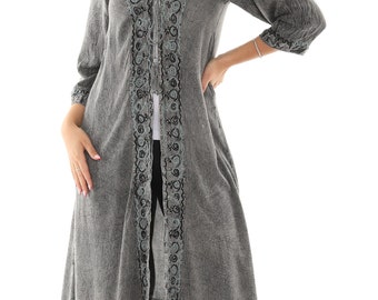 May include: A gray long-sleeved cardigan with a V-neckline and intricate embroidery along the front. The cardigan has a relaxed fit and a flowing silhouette.