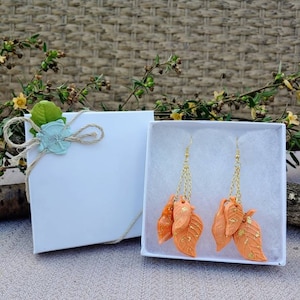 Dangling orange fall leaves with gold leaf and gold chains