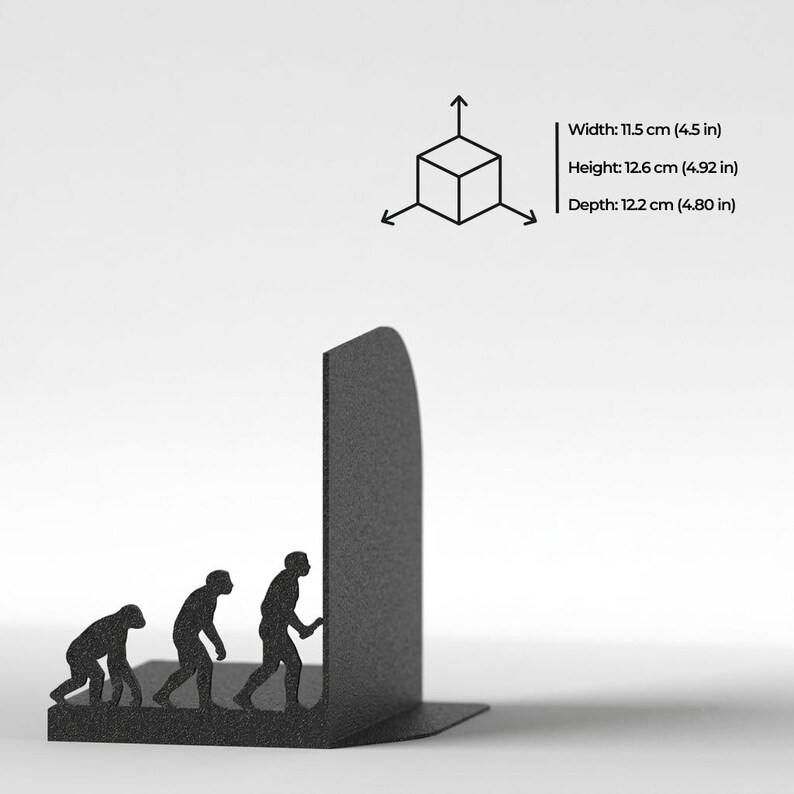 May include: A black metal bookend featuring a silhouette of human evolution. The product dimensions are listed as 11.5 cm in width, 12.6 cm in height, and 12.2 cm in depth, accompanied by a 3D cube icon with directional arrows.