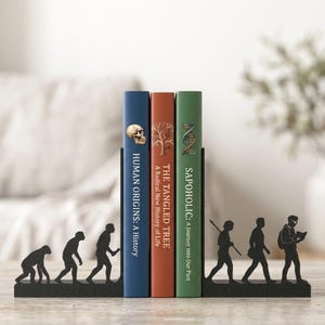 Evolution of Man Bookends | Homo Bibliophilus Book Ends | Matte Black 3D Printed Bookends | Gift for Readers, History & Science Lover