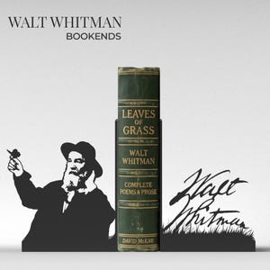 May include: Black metal bookends featuring a silhouette of Walt Whitman and his signature, holding a book titled "Leaves of Grass." The book is green with gold lettering. The text "Walt Whitman Bookends" is at the top.