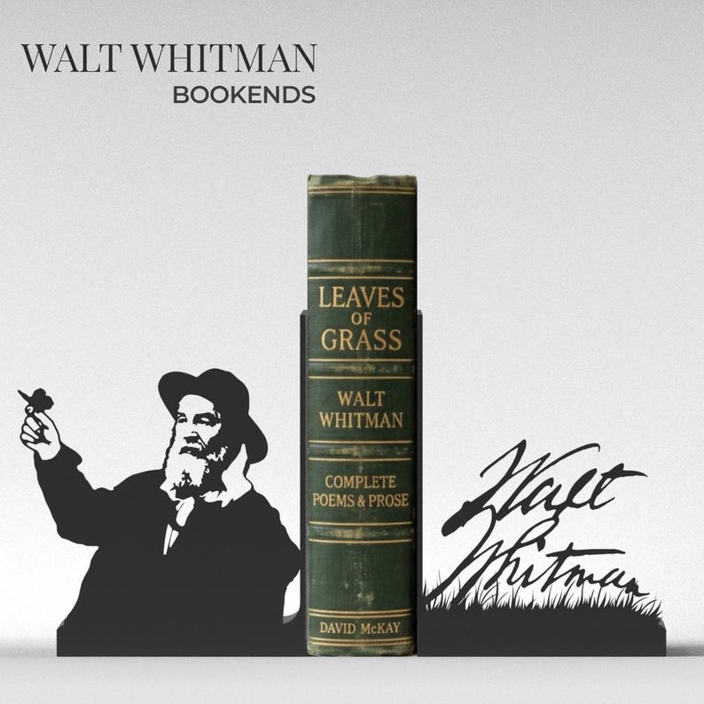 May include: Black metal bookends featuring a silhouette of Walt Whitman and his signature, holding a book titled "Leaves of Grass." The book is green with gold lettering. The text "Walt Whitman Bookends" is at the top.
