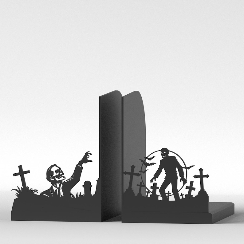 Puede incluir: Sujetalibros de metal negro con tem&aacute;tica de zombis. Uno muestra un zombi saliendo de una tumba, el otro un zombi caminando entre l&aacute;pidas y murci&eacute;lagos. Dise&ntilde;ados para mantener los libros en posici&oacute;n vertical.