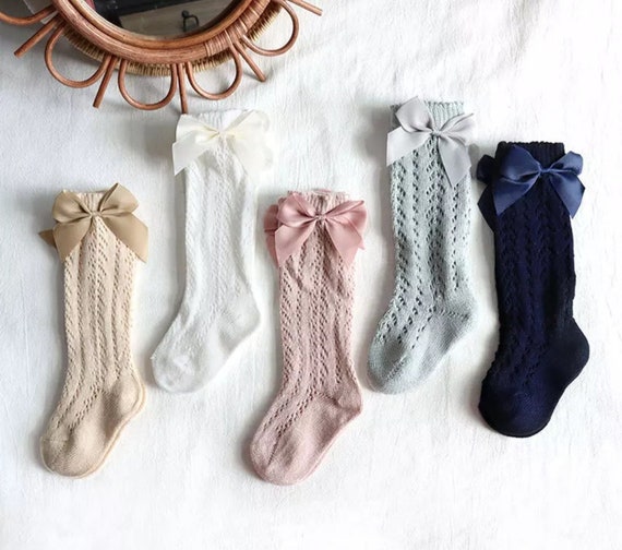 Elegantes calcetines para bebé de algodón rosa intenso con lazos de  purpurina
