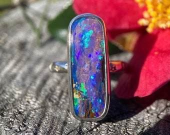 Flashy bright Purple Australian pipe opal ring in silver size 8.