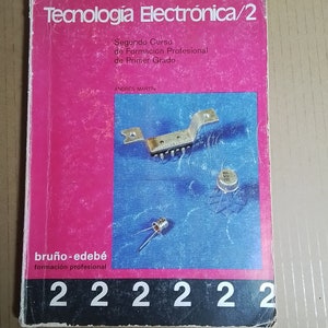 Może przedstawiać: Różowa i niebieska okładka książki z tytułem "Tecnología Electrónica/2" i tekstem "Segundo Curso de Formación Profesional de Primer Grado" oraz "ANDRÉS MARTÍN". Okładka zawiera również tekst "bruño-edebé formación profesional" i numer "222222".
