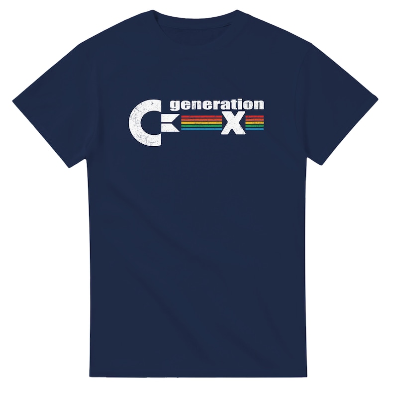 May include: Navy blue t-shirt with the text "generation X" in white and a rainbow-colored stripe. The design features a distressed, vintage aesthetic. The shirt is a short-sleeved crew neck.