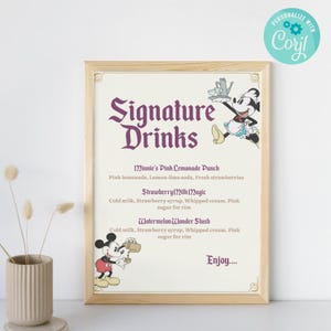 May include: A framed sign with the text "Signature Drinks" in a decorative font. The sign lists drink recipes like "Minnie's Pink Lemonade Punch" and "Strawberry Milk Magic", with cartoon illustrations. The sign is in a light wood frame.