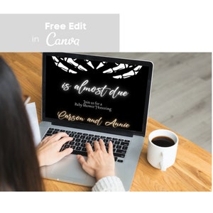 May include: A laptop computer screen displaying a black and white baby shower invitation with the text "is almost due" and "Join us for a Baby Shower Honoring Carson and Annie".