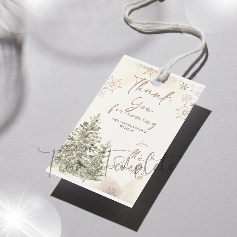 May include: A white thank you tag with a winter theme. It features a watercolor illustration of pine trees and snowflakes. The text reads "Thank You for coming and celebrate our with us. Love, the Sedlarks".