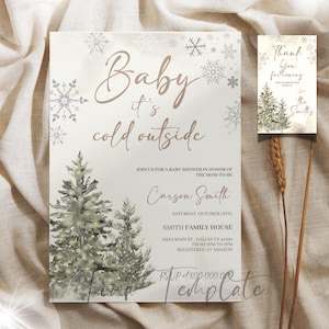 May include: A baby shower invitation with a winter theme. The invitation features a watercolor illustration of two pine trees with twinkling lights, snowflakes, and the text "Baby it's cold outside". The invitation also includes the name "Carson Smith", the date "Saturday, October 15th", and the location "Smith Family House".