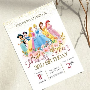 May include: A pink and gold princess-themed birthday invitation with a floral border. The invitation features a group of Disney princesses, including Cinderella, Ariel, Belle, Snow White, and Jasmine. The text on the invitation reads "Join us to celebrate Princess Annie's 3rd Birthday" and includes the date, time, and location of the party.